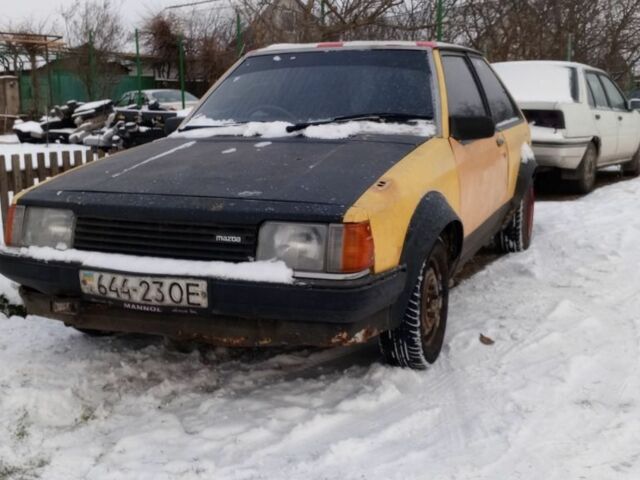 Желтый Мазда 323, объемом двигателя 0 л и пробегом 100 тыс. км за 226 $, фото 1 на Automoto.ua