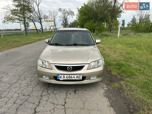 Желтый Мазда 323, объемом двигателя 1.6 л и пробегом 225 тыс. км за 2900 $, фото 1 на Automoto.ua