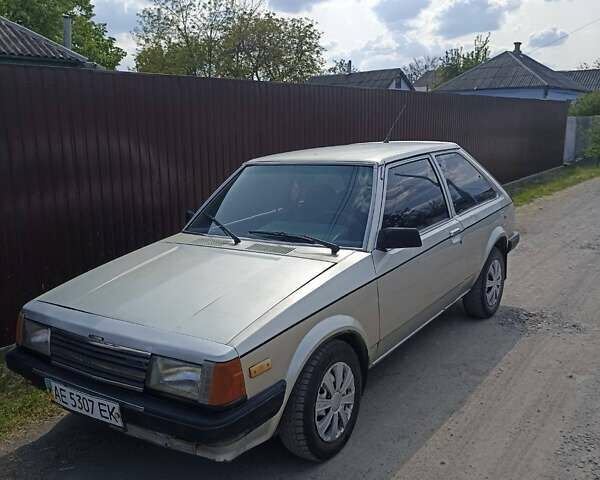 Серый Мазда 323, объемом двигателя 0 л и пробегом 99 тыс. км за 650 $, фото 1 на Automoto.ua
