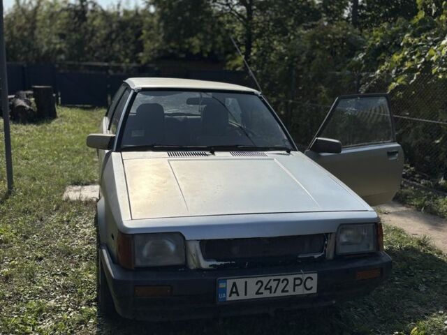 Серый Мазда 323, объемом двигателя 1.3 л и пробегом 59 тыс. км за 674 $, фото 1 на Automoto.ua