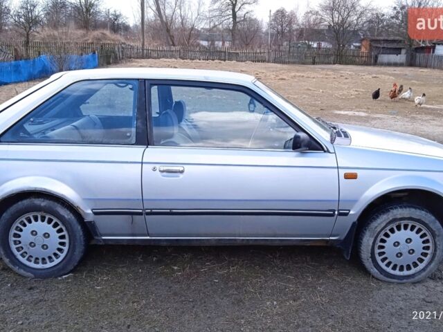 Сірий Мазда 323, об'ємом двигуна 1.5 л та пробігом 250 тис. км за 400 $, фото 1 на Automoto.ua