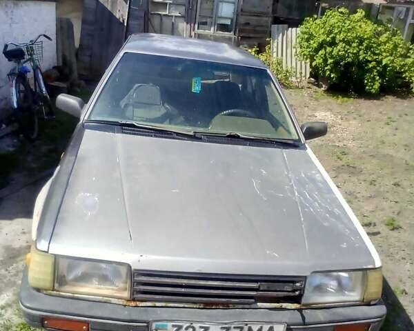 Серый Мазда 323, объемом двигателя 1.5 л и пробегом 800 тыс. км за 650 $, фото 1 на Automoto.ua