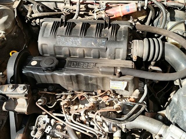 Серый Мазда 323, объемом двигателя 1.7 л и пробегом 629 тыс. км за 660 $, фото 1 на Automoto.ua