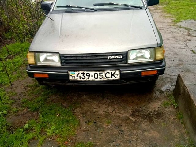 Сірий Мазда 323, об'ємом двигуна 1.5 л та пробігом 500 тис. км за 380 $, фото 1 на Automoto.ua