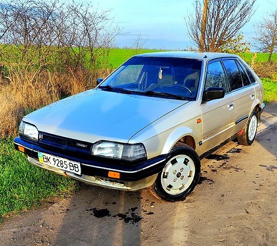 Сірий Мазда 323, об'ємом двигуна 1.3 л та пробігом 454 тис. км за 850 $, фото 1 на Automoto.ua