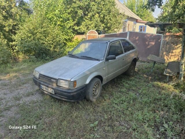 Сірий Мазда 323, об'ємом двигуна 1.5 л та пробігом 234 тис. км за 448 $, фото 1 на Automoto.ua