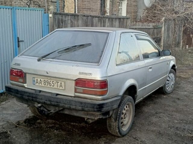 Серый Мазда 323, объемом двигателя 1.5 л и пробегом 500 тыс. км за 569 $, фото 1 на Automoto.ua