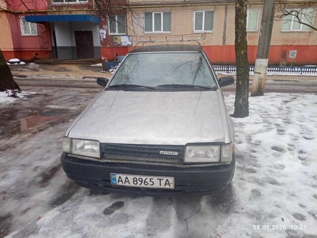 Серый Мазда 323, объемом двигателя 1.5 л и пробегом 230 тыс. км за 650 $, фото 1 на Automoto.ua