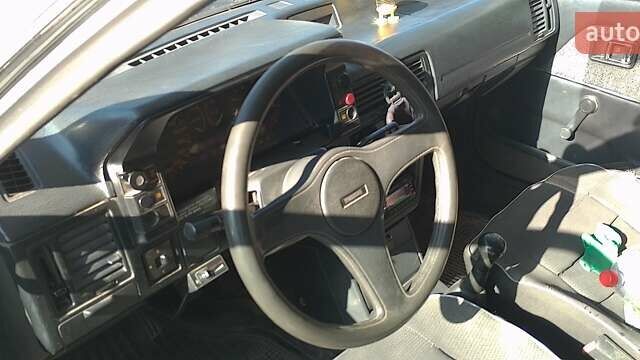 Серый Мазда 323, объемом двигателя 1.3 л и пробегом 300 тыс. км за 1000 $, фото 1 на Automoto.ua