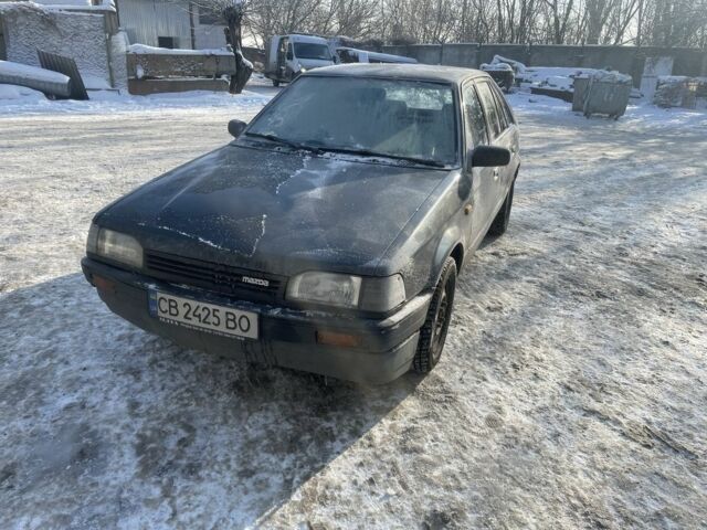 Серый Мазда 323, объемом двигателя 1.3 л и пробегом 442 тыс. км за 900 $, фото 1 на Automoto.ua