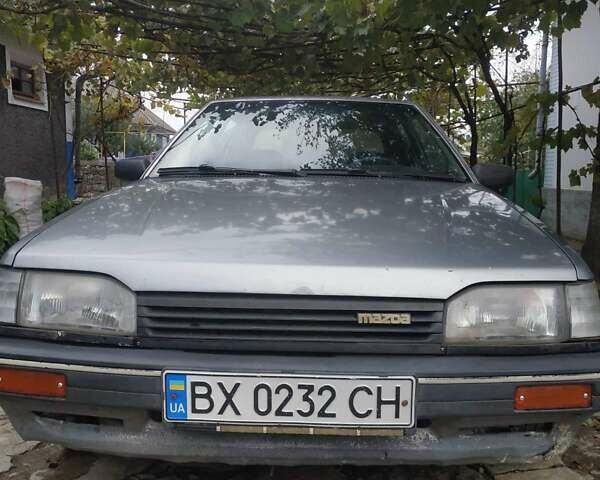 Серый Мазда 323, объемом двигателя 1.3 л и пробегом 514 тыс. км за 949 $, фото 1 на Automoto.ua