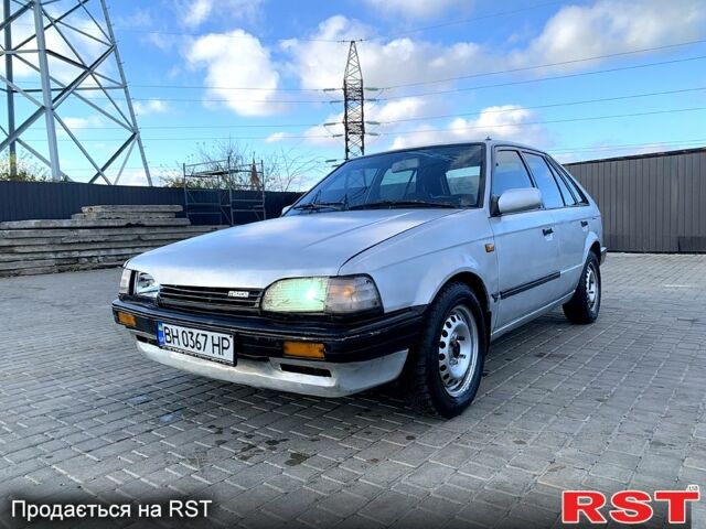 Сірий Мазда 323, об'ємом двигуна 1.3 л та пробігом 135 тис. км за 500 $, фото 1 на Automoto.ua