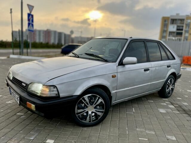 Сірий Мазда 323, об'ємом двигуна 1.3 л та пробігом 300 тис. км за 652 $, фото 1 на Automoto.ua