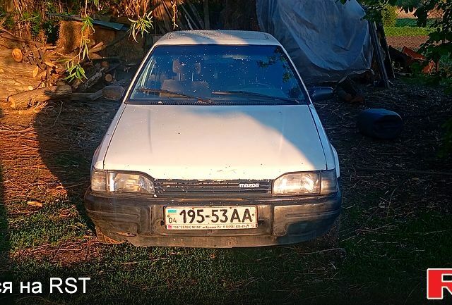 Серый Мазда 323, объемом двигателя 1.7 л и пробегом 100 тыс. км за 790 $, фото 1 на Automoto.ua