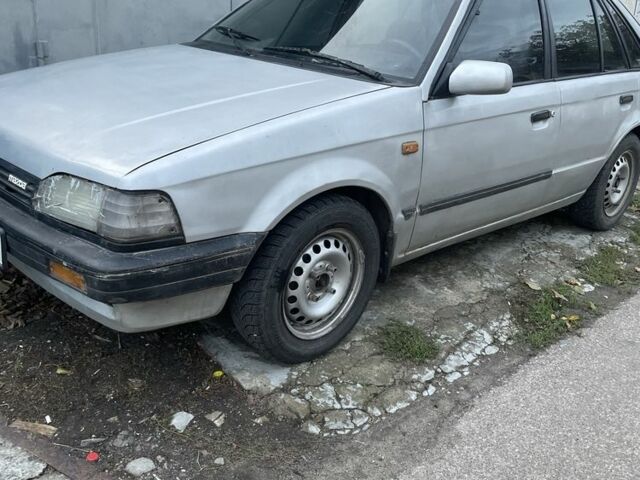 Серый Мазда 323, объемом двигателя 1.3 л и пробегом 3 тыс. км за 650 $, фото 1 на Automoto.ua