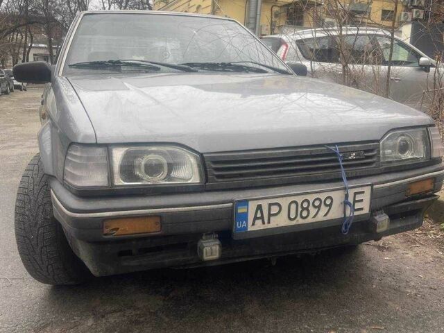 Серый Мазда 323, объемом двигателя 1.7 л и пробегом 3 тыс. км за 850 $, фото 1 на Automoto.ua