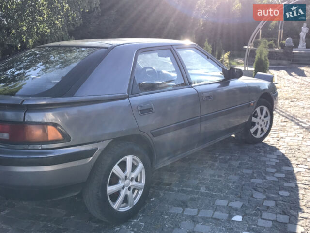 Сірий Мазда 323, об'ємом двигуна 1.6 л та пробігом 426 тис. км за 1900 $, фото 1 на Automoto.ua