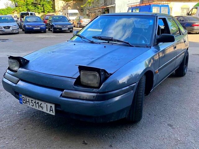 Сірий Мазда 323, об'ємом двигуна 1.6 л та пробігом 185 тис. км за 899 $, фото 1 на Automoto.ua