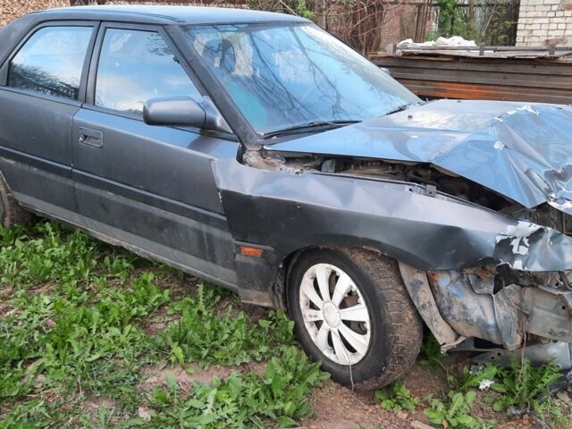 Серый Мазда 323, объемом двигателя 1.8 л и пробегом 380 тыс. км за 776 $, фото 1 на Automoto.ua