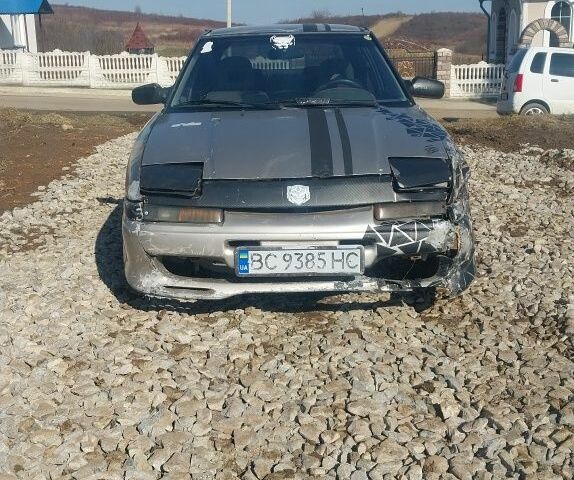 Серый Мазда 323, объемом двигателя 1.6 л и пробегом 200 тыс. км за 500 $, фото 1 на Automoto.ua