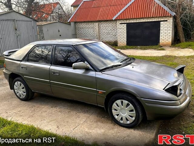 Сірий Мазда 323, об'ємом двигуна 1.6 л та пробігом 200 тис. км за 1100 $, фото 1 на Automoto.ua