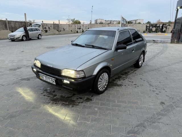 Сірий Мазда 323, об'ємом двигуна 1.5 л та пробігом 218 тис. км за 1205 $, фото 1 на Automoto.ua