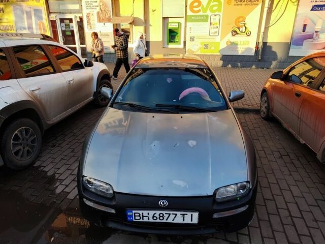 Сірий Мазда 323, об'ємом двигуна 1.5 л та пробігом 293 тис. км за 3000 $, фото 1 на Automoto.ua