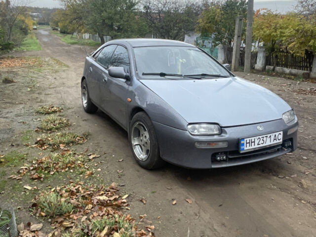 Сірий Мазда 323, об'ємом двигуна 2 л та пробігом 280 тис. км за 2000 $, фото 1 на Automoto.ua