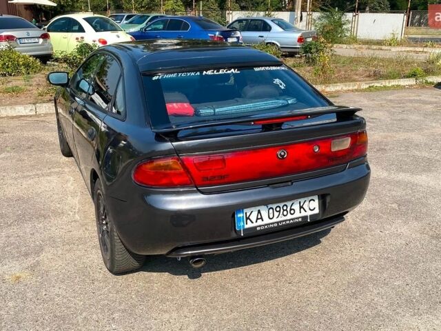 Сірий Мазда 323, об'ємом двигуна 2 л та пробігом 248 тис. км за 3500 $, фото 1 на Automoto.ua