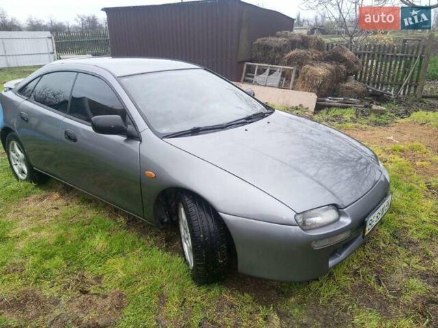 Сірий Мазда 323, об'ємом двигуна 2 л та пробігом 300 тис. км за 3000 $, фото 1 на Automoto.ua