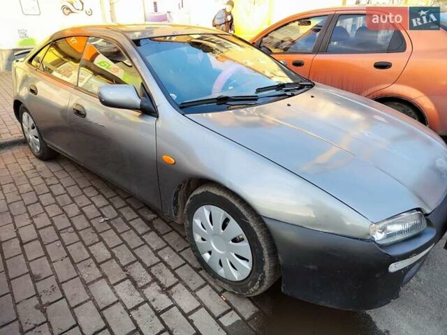 Сірий Мазда 323, об'ємом двигуна 1.6 л та пробігом 293 тис. км за 3000 $, фото 1 на Automoto.ua
