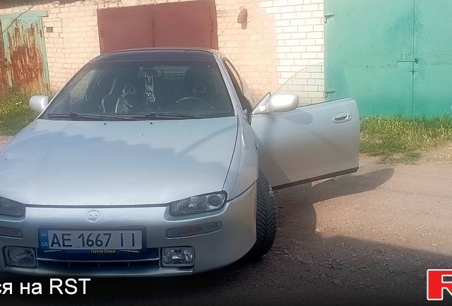 Серый Мазда 323, объемом двигателя 2 л и пробегом 160 тыс. км за 2000 $, фото 1 на Automoto.ua