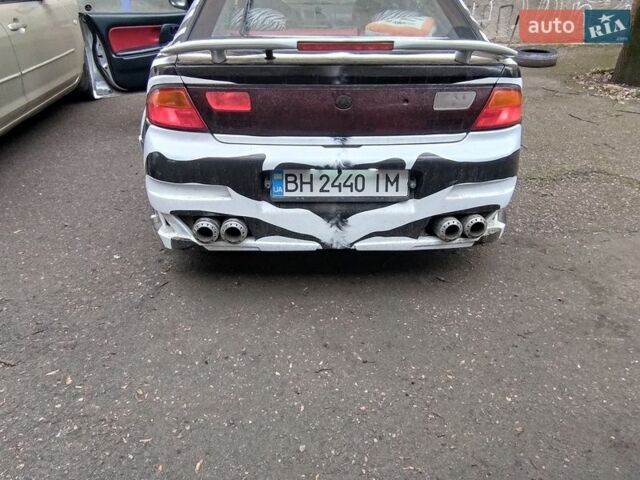 Сірий Мазда 323, об'ємом двигуна 1.49 л та пробігом 307 тис. км за 2000 $, фото 1 на Automoto.ua