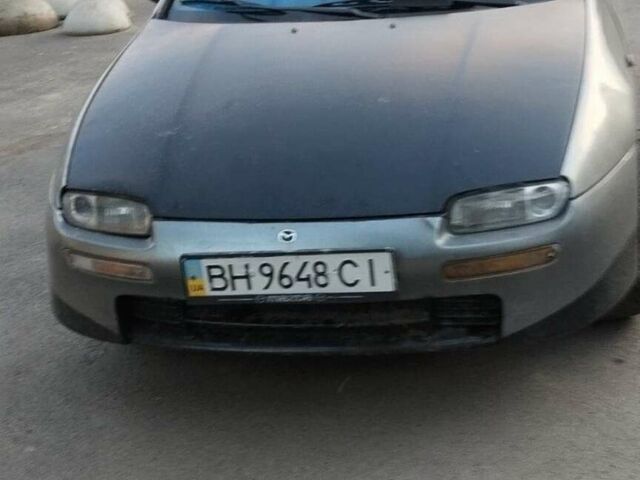 Серый Мазда 323, объемом двигателя 1.5 л и пробегом 100 тыс. км за 1800 $, фото 1 на Automoto.ua