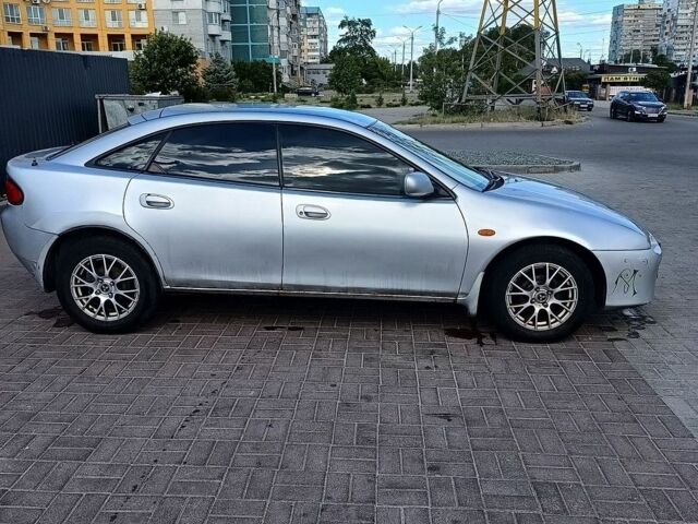 Сірий Мазда 323, об'ємом двигуна 1.5 л та пробігом 481 тис. км за 1500 $, фото 1 на Automoto.ua