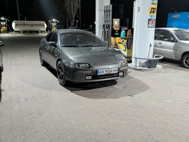 Серый Мазда 323, объемом двигателя 1.5 л и пробегом 257 тыс. км за 906 $, фото 1 на Automoto.ua