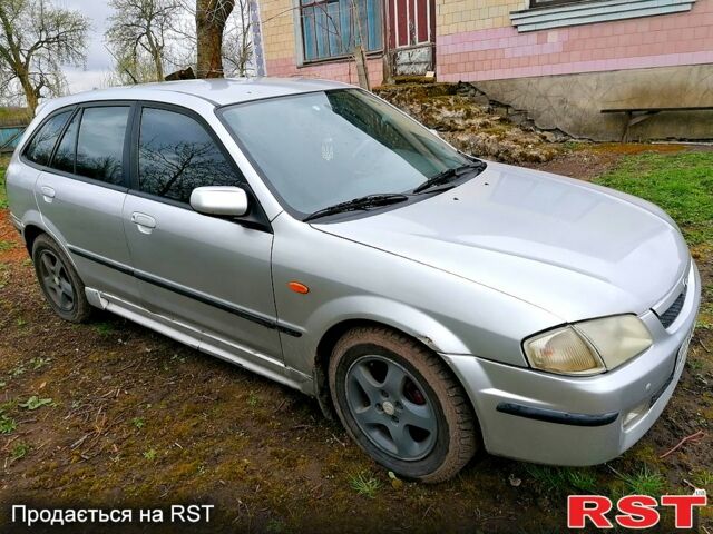 Серый Мазда 323, объемом двигателя 1.8 л и пробегом 315 тыс. км за 2200 $, фото 1 на Automoto.ua