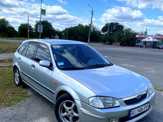 Сірий Мазда 323, об'ємом двигуна 1.5 л та пробігом 286 тис. км за 3000 $, фото 1 на Automoto.ua