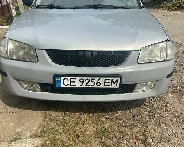 Серый Мазда 323, объемом двигателя 1.5 л и пробегом 285 тыс. км за 2050 $, фото 1 на Automoto.ua