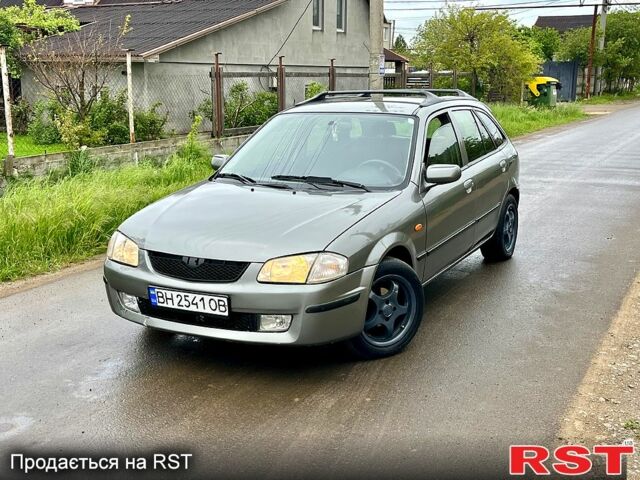 Серый Мазда 323, объемом двигателя 1.5 л и пробегом 270 тыс. км за 1950 $, фото 1 на Automoto.ua