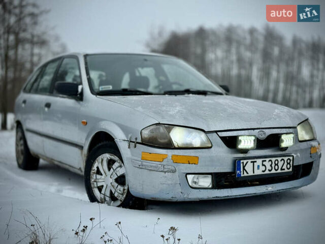 Серый Мазда 323, объемом двигателя 2 л и пробегом 389 тыс. км за 725 $, фото 1 на Automoto.ua