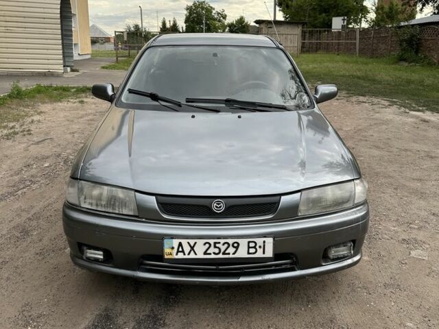 Серый Мазда 323, объемом двигателя 1.3 л и пробегом 320 тыс. км за 1650 $, фото 1 на Automoto.ua