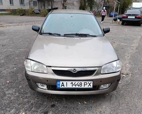 Серый Мазда 323, объемом двигателя 1.5 л и пробегом 230 тыс. км за 2800 $, фото 1 на Automoto.ua