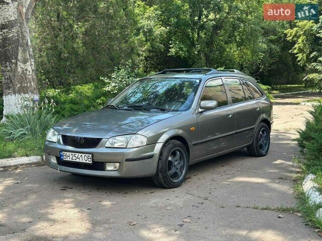 Серый Мазда 323, объемом двигателя 1.5 л и пробегом 405 тыс. км за 2150 $, фото 1 на Automoto.ua