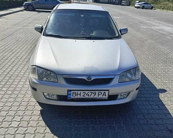 Серый Мазда 323, объемом двигателя 1.8 л и пробегом 408 тыс. км за 2600 $, фото 1 на Automoto.ua