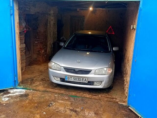 Серый Мазда 323, объемом двигателя 1.6 л и пробегом 488 тыс. км за 3550 $, фото 1 на Automoto.ua