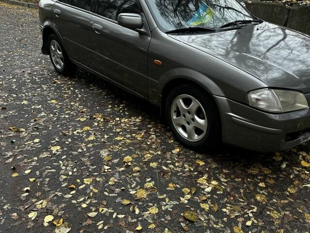 Серый Мазда 323, объемом двигателя 1.5 л и пробегом 315 тыс. км за 1300 $, фото 1 на Automoto.ua