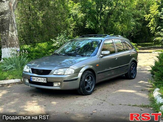 Серый Мазда 323, объемом двигателя 1.5 л и пробегом 405 тыс. км за 2150 $, фото 1 на Automoto.ua
