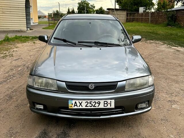 Серый Мазда 323, объемом двигателя 1.3 л и пробегом 320 тыс. км за 1650 $, фото 1 на Automoto.ua
