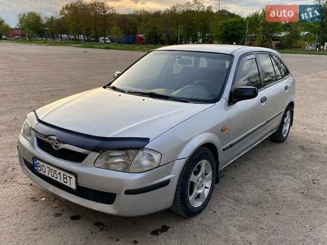 Сірий Мазда 323, об'ємом двигуна 2 л та пробігом 335 тис. км за 2150 $, фото 1 на Automoto.ua